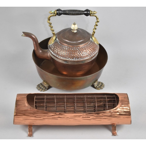 108 - A Copper Planter in the Form of a Log, a Copper and Brass Kettle and a Brass Three Footed Bowl