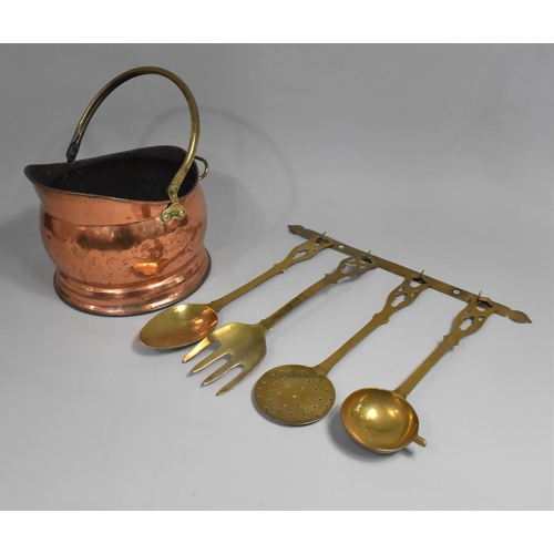 119 - A Copper and Brass Helmet Shaped Coal Scuttle together with a Collection of Reproduction Brass Spoon... 
