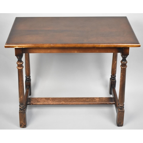 120 - A Mid 20th Century Rectangular Side Table with turned Supports, 76cms Wide by 38cms