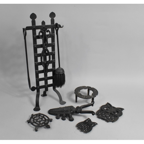 306 - A Collection of Metalwares to Compirse Wrought Iron Fire Companion, Beetle Boot Pull, Trivet Stands ... 