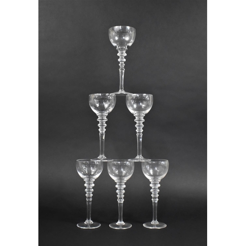 313 - A Set of Six Triple Tapering Knop Stemmed Hock Wine Glasses