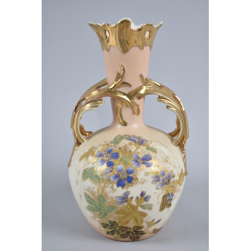 330 - A Blush Ivory Twin Handled Vase in the Aesthetic Style with Floral Decoration and Gilt Trim, 21cm hi... 