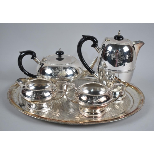 78 - A Four Piece Silver Plated Tea Service on Oval Tray