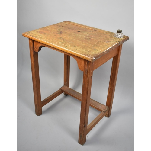 90 - A Stained Pine Work Desk with Inset Glass Inkwell, 60cms Wide and 77cms High