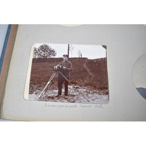 104 - A Vintage Photograph Album Containing Early 20th Century Photographs to Include Several Military