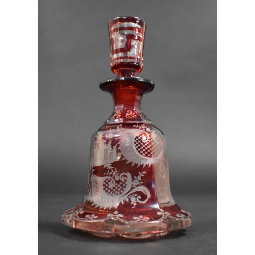 314 - A Bohemian Overlaid Ruby Glass Scent Bottle Decorated with Hunting Scenes, 16.5cm high