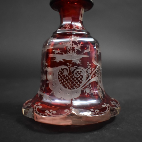 314 - A Bohemian Overlaid Ruby Glass Scent Bottle Decorated with Hunting Scenes, 16.5cm high