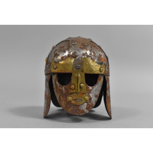 32 - A Small Tin Plate and Brass Copy of the Sutton Hoo Saxon Helmet, 9cm High