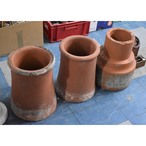 346 - Three Terracotta Chimney Pots, 37cm high