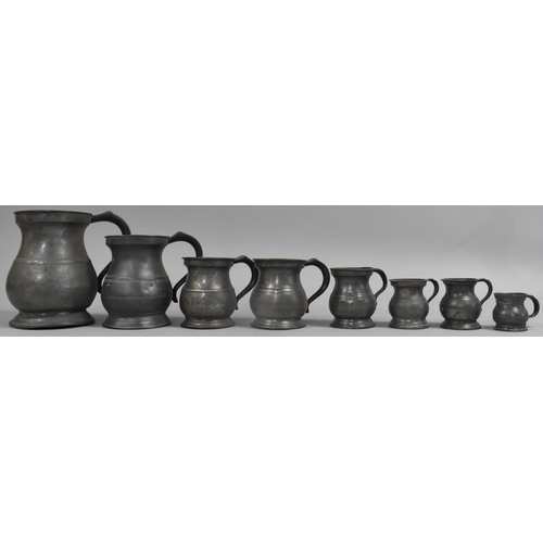 398 - A Collection of Pewter Measuring Jugs and Tankards