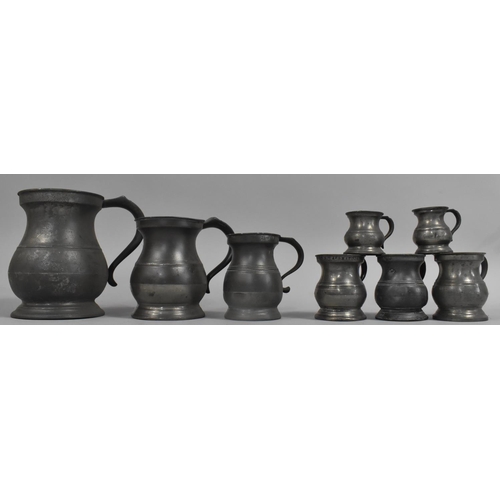 399 - A Collection of Various 19th Century Pewter Measuring Jugs