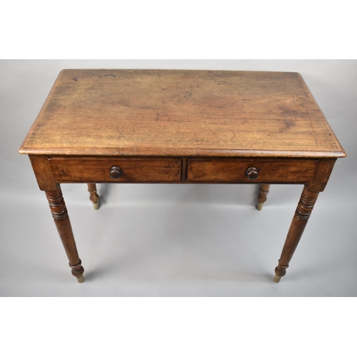 24 - A Late 19th Century Two Drawer Side Table with Turned Supports, 96cms Wide