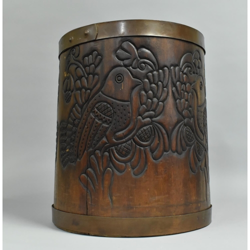 114 - A Carved Wooden Cylindrical Waste Bin Decorated with Birds, 30cm Diameter and 36cm high