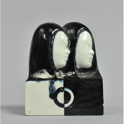 120 - A Black and White Glazed Ceramic Small Sculpture, The Twins, 10cm high