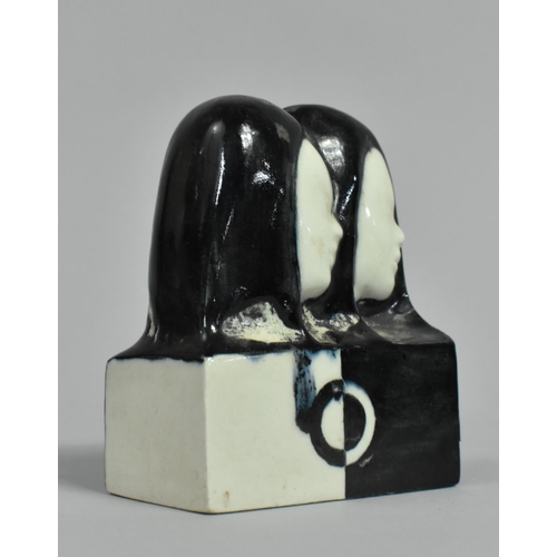 120 - A Black and White Glazed Ceramic Small Sculpture, The Twins, 10cm high