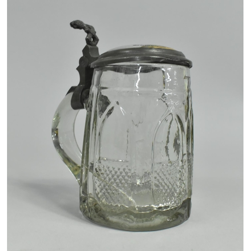 31 - A Moulded Glass Continental Stein with Decorated Hinged Ceramic and Pewter Lid, Crack to Body, 17cms... 