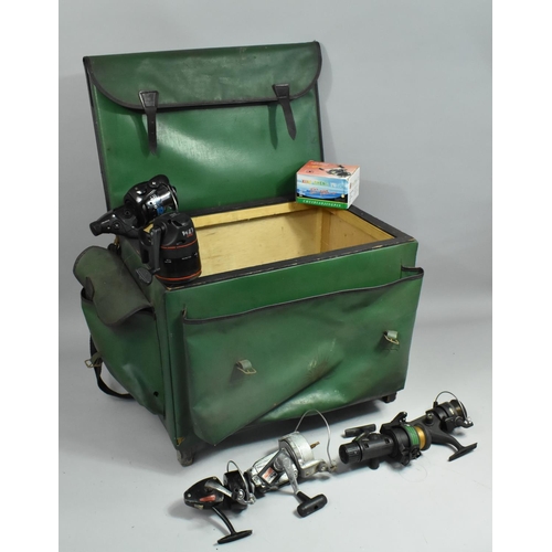 A Vintage Leather Mounted Fishing Tackle Box containing Fishing Reels