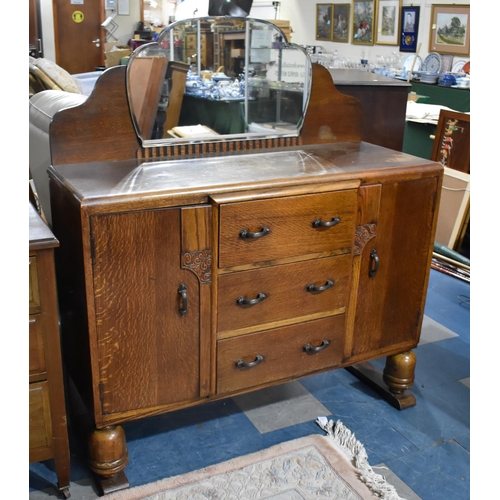 453 - An Edwardian Oak Mirror Back Sideboard with Three Centre Drawers, 121cm wide