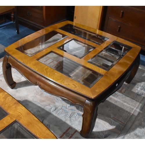 463 - A Modern Chinese Burr walnut and Glass Topped Coffee Table on Scrolled Supports, 95cm Square