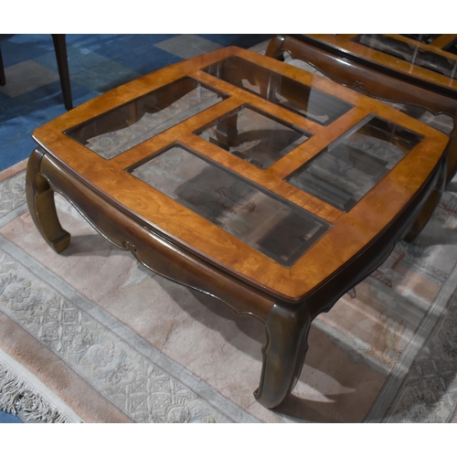 465 - A Modern Chinese Burr walnut and Glass Topped Coffee Table on Scrolled Supports, 95cm Square