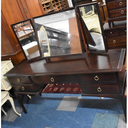 475 - A Stag Mahogany Dressing Table with Six Short Drawers and Triple Mirror Back, 130cm wide