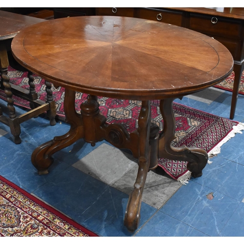 481 - A Veneered Oval Centre Table on Scrolled Supports, 110cm wide