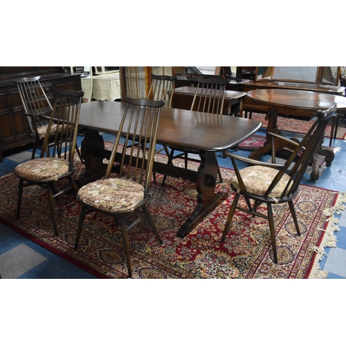 483 - An Ercol Refectory Dining Table, 180x86cm Together with Six Dining Chairs to Include Two Carvers