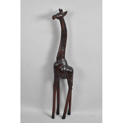 62 - A Tall Carved Wooden Study of a Giraffe, 97cm high