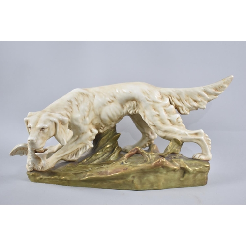 67 - A Royal Dux Ceramic Study of Sporting Dog with Bird, Tail AF , Naturalistic Base, 41cm Long