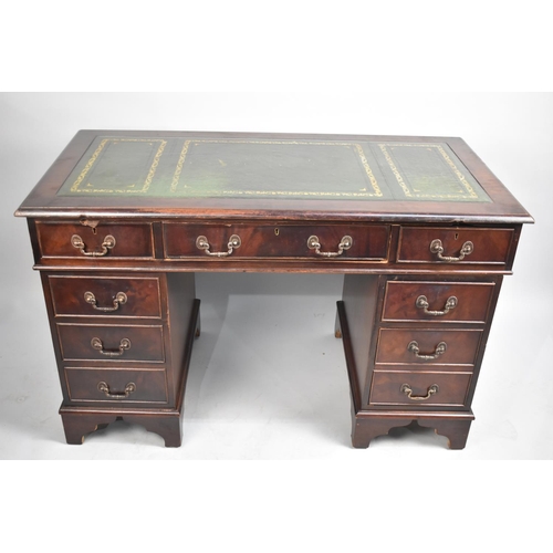 73 - A Mid/Late 20th Century Mahogany Kneehole Writing Desk with Tooled Leather Top, 122cm wide