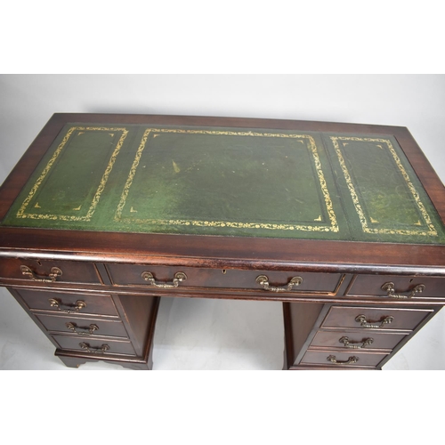 73 - A Mid/Late 20th Century Mahogany Kneehole Writing Desk with Tooled Leather Top, 122cm wide