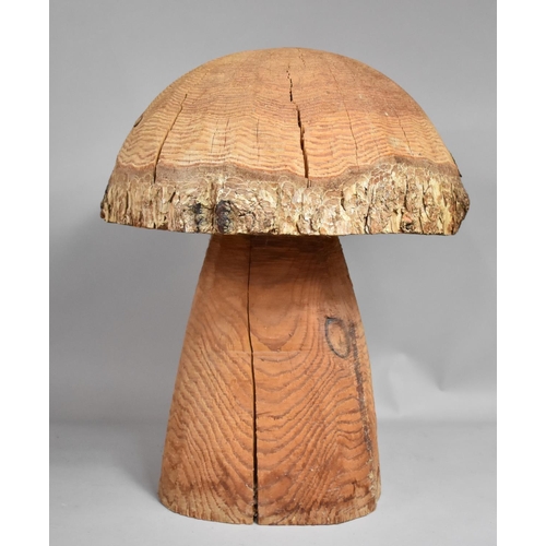 502 - A Carved Wooden Garden Ornament in the Form of a Mushroom, 54cms High