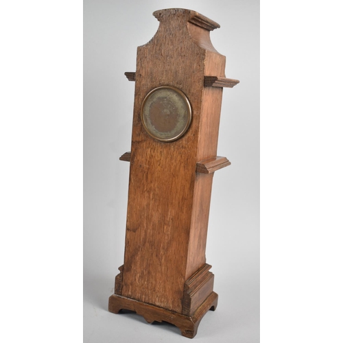 20 - An Edwardian Brass Mounted Oak Novelty Mantel Clock in the Form of a Long Cased Clock, 39cms High