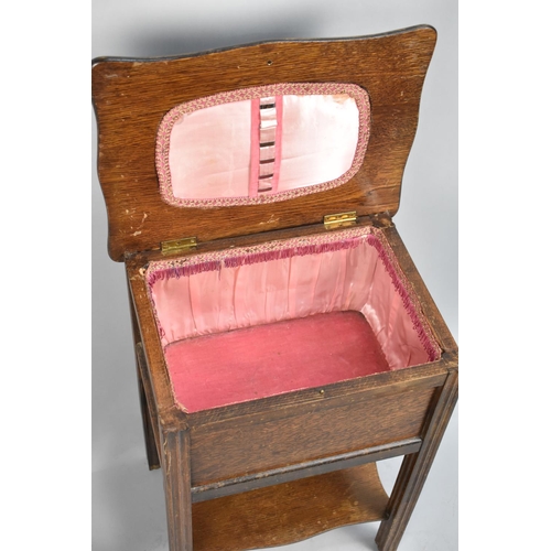 223 - A MId 20th Century Oak Lift Top Sewing Box on Stand with Stretcher Shelf, Fitted Interior, 54cm wide