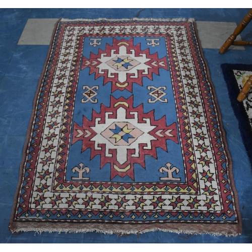 489 - A Patterned Woollen Rug, 144x98cm