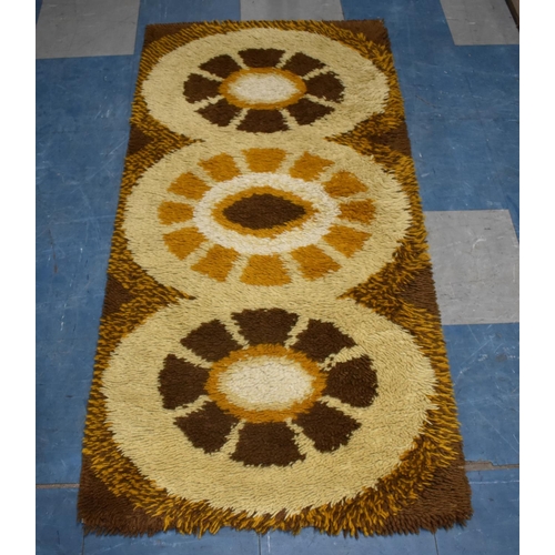 497 - A 1970's Reichel Patterned Woollen Rug, 140x67cm