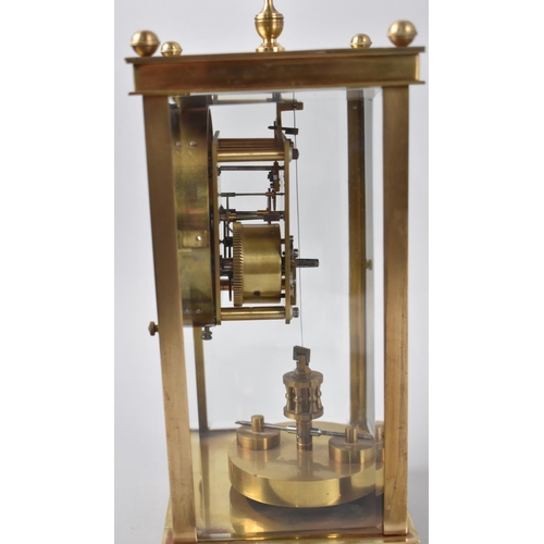 5 - An Early 20th Century Gilt Brass Cased Four Glass Clock with Torsion Movement, White Enamelled Dial ... 