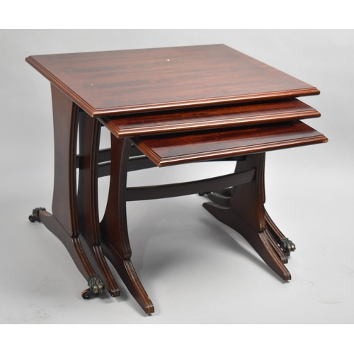 66 - A Modern Mahogany Cross Banded Nest of Three Tables, 56cms Wide