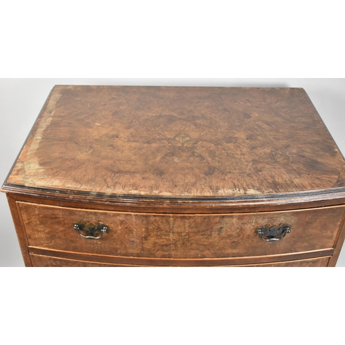 90 - A Mid 20th Century Bow Fronted Burr Walnut Chest of Four Drawers, 76cm wide