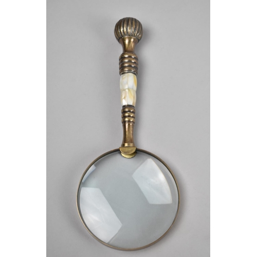 11 - A Brass and Mother of Pearl Handled Desktop Magnifying Glass, 26cms Long