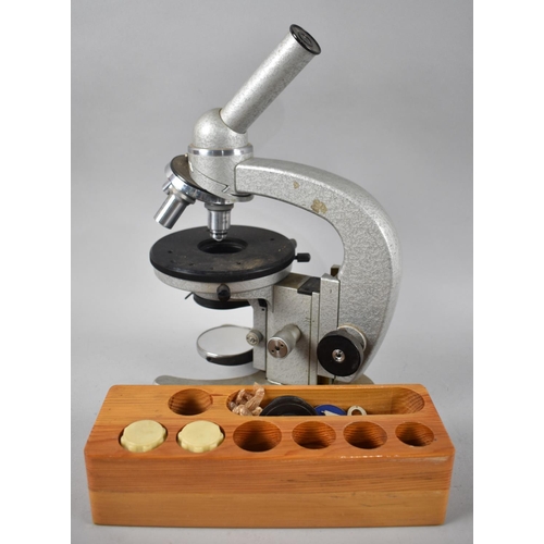 113 - A Vintage Russian Monocular Microscope with Spare Lenses etc