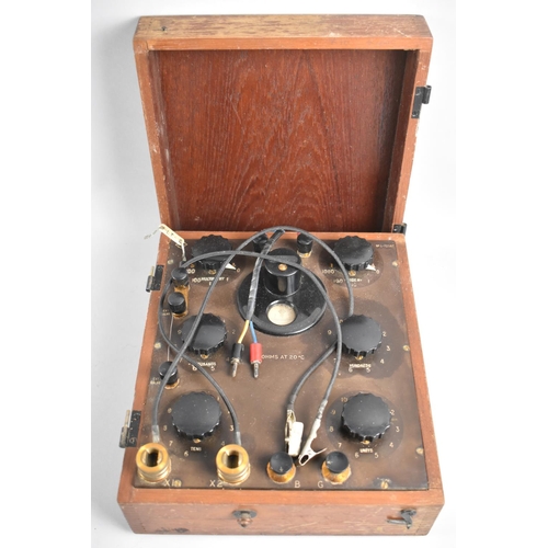 122 - A Vintage Cased Ohm Meter, 26cm Wide