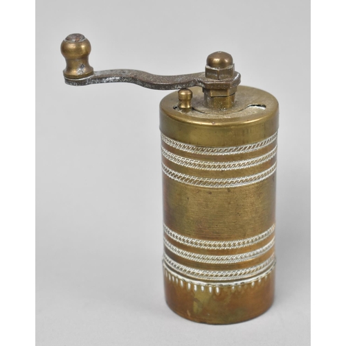 17 - A Vintage Far Eastern Brass Spice Grinder of Cylindrical Form, 9cms High