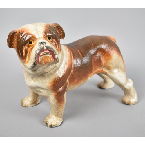 26 - A Heavy Cast Iron Door Stop in the Form of a Bulldog, 21cms Wide