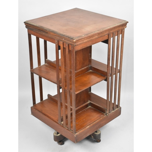27 - A Late 19th/Early 20th Century Mahogany Revolving Bookcase in need of Some Restoration and Repair, 4... 