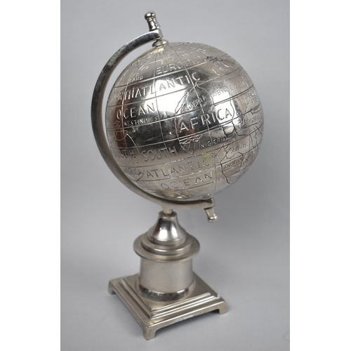30 - An Indian Silver Plated Desktop Novelty Globe, 31cms High