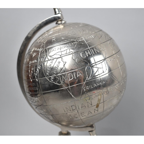 30 - An Indian Silver Plated Desktop Novelty Globe, 31cms High