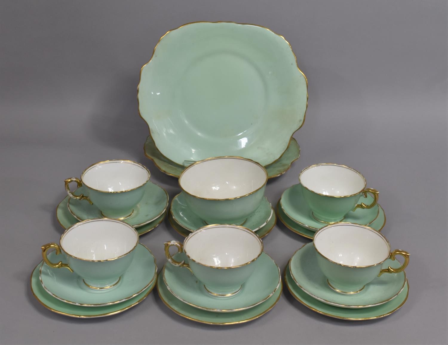 A Part Crown Staffordshire Teal and Gilt Trim Tea Set to comprise Five