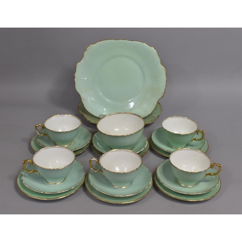 A Part Crown Staffordshire Teal and Gilt Trim Tea Set to comprise Five