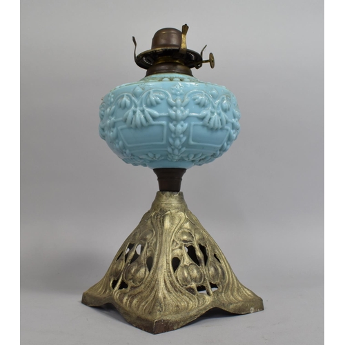 40 - A Late Victorian Pierced Cast Iron Based Oil lamp with Opaque Blue Glass Reservoir, No Shade or Chim... 